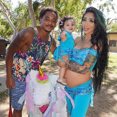 A picture of Corde with his girlfriend and daughter Elleven Love.